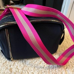 Stella & Dot Crush it Camera bag with hot pink strap.
